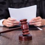 Judge Holding Documents