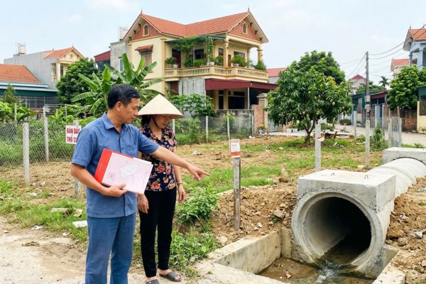 Mua nhà đất có sổ đỏ nhưng đất có cống thoát nước mưa
